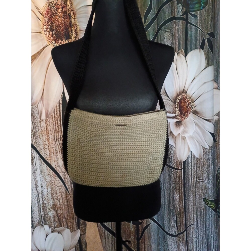 taupe crochet crossbody purse is by The Sak